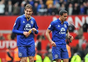 Images Dated 22nd April 2012: Thrilling Showdown at Old Trafford: Jelavic vs. Cahill - Everton's Battle Against Manchester