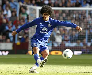 Thunderous Performance: Marouane Fellaini's Unforgettable Game Against Aston Villa (Everton vs. Aston Villa, Barclays Premier League, 2010)
