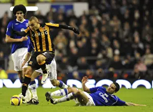 Framed Print : Tim Cahill vs Craig Fagan: Clash between Everton's Cahill and Hull City's Fagan in the 2009 Barclays Premier League