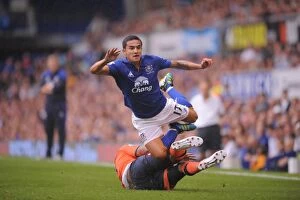 Images Dated 20th August 2011: Tim Cahill vs. Fitz Hall: Epic Clash at Goodison Park - Everton vs