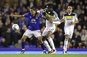 Images Dated 26th October 2011: Tim Cahill vs Mikel: A Carling Cup Showdown at Goodison Park (2011)