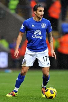 Images Dated 13th February 2011: Tim Cahill's Thrilling Performance: Everton vs. Bolton Wanderers