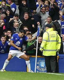 Images Dated 17th October 2010: Tim Cahill's Thunderbolt: Everton's Historic First Goal Against Liverpool at Goodison Park