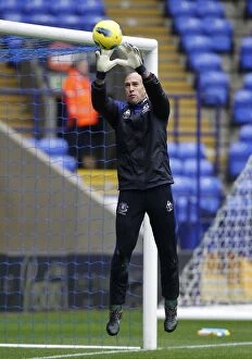 Images Dated 26th November 2011: Tim Howard: Everton's Focused Goalkeeper Gears Up for Bolton Wanderers Clash