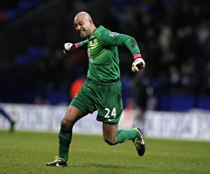 Images Dated 26th January 2013: Tim Howard's Exultant Moment: Everton's FA Cup Victory at Reebok Stadium (2-1)