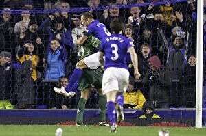 Images Dated 4th January 2012: Tim Howard's Shocking Goal: Everton's Unforgettable 1-0 Victory Over Bolton Wanderers