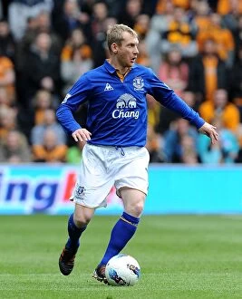 06 May 2012 v Wolverhampton Wanderers, Molineux Stadium Collection: Tony Hibbert vs. Wolverhampton Wanderers: Everton's Defender Faces Off in Barclays Premier League