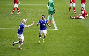 Everton 3 V Arsenal 0 : Goodison Park : 06-04-2014 Prints: Triumphant Everton: Mirallas, Naismith Celebrate Arteta's Own Goal (3-0 vs Arsenal)