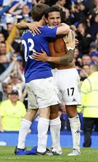 Images Dated 17th October 2010: Unforgettable Derby Victory: Tim Cahill and Phil Neville's Emotional Celebration at Goodison Park