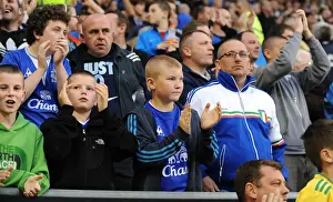 Carling Cup Prints: Unwavering Passion: Everton FC's Sea of Supporters at Goodison Park (2010) - Everton vs Huddersfield Town