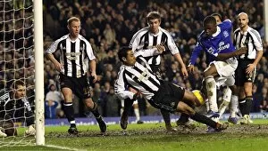 Everton v Newcastle United Collection: Victor Anichebe scores his and his teams second goal of the game