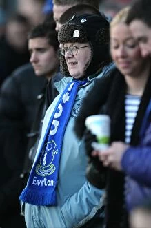 Images Dated 8th January 2011: Wrapped Up in Blue: Everton Fan Braves Cold Weather at Scunthorpe United (FA Cup Third Round)